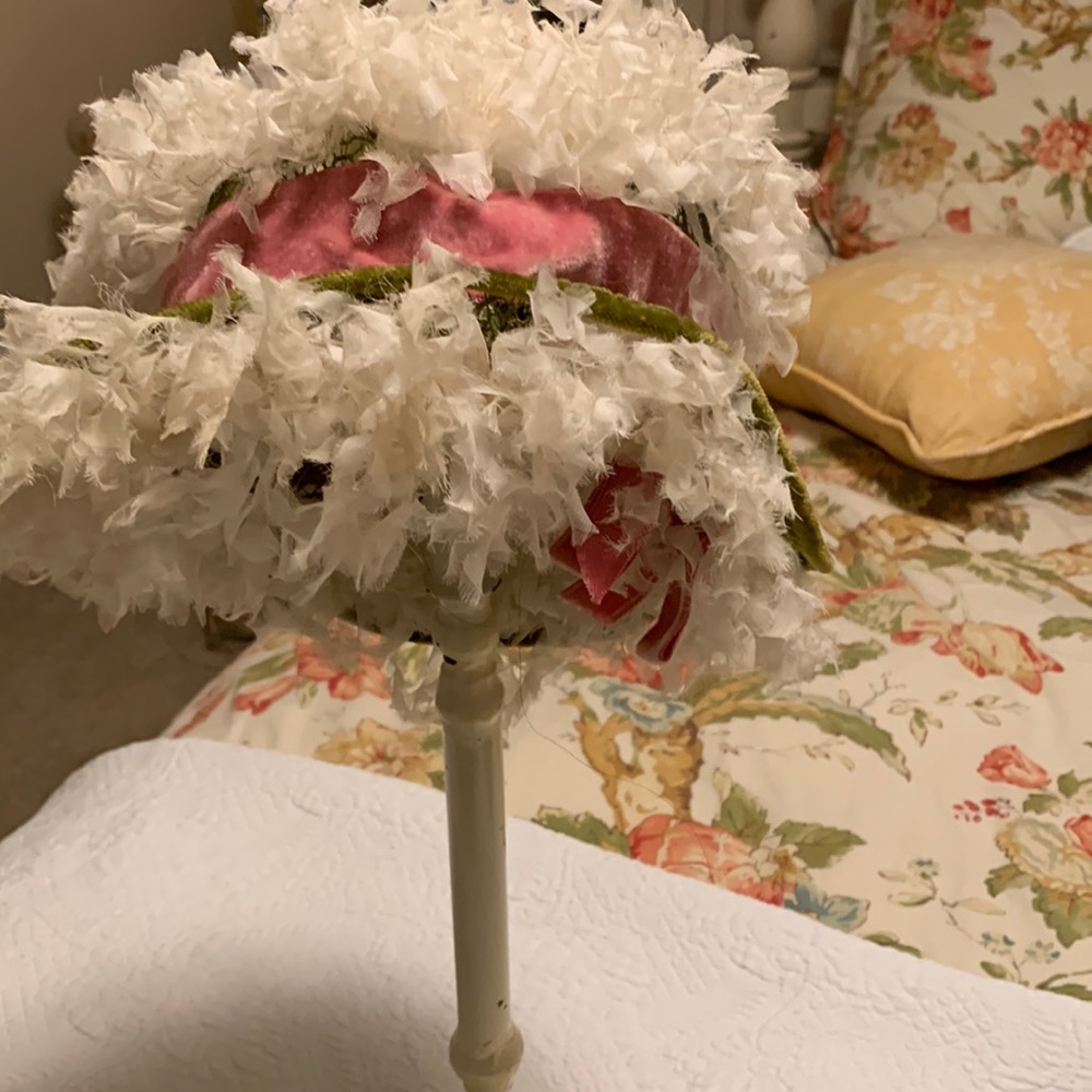 Vintage spring hat with green velvet trim and pink bow.